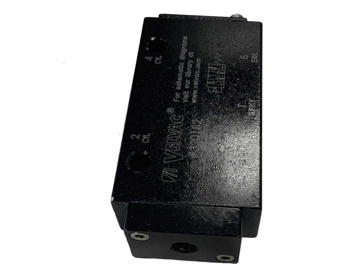 Four-way air pilot spring return valve